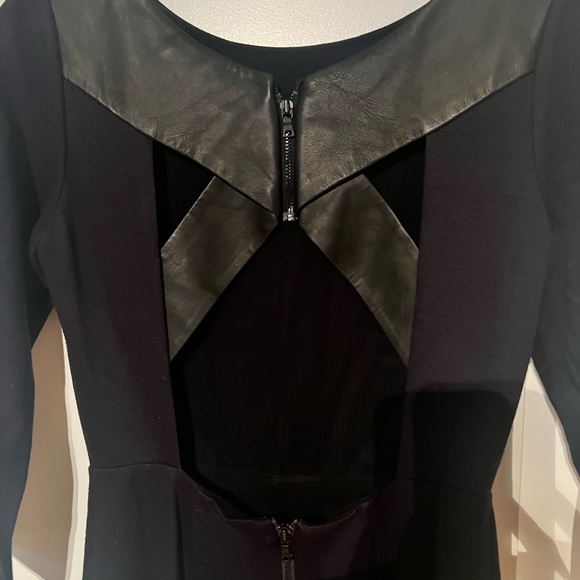 Alice & Olivia black dress with leather crisscrossed back.